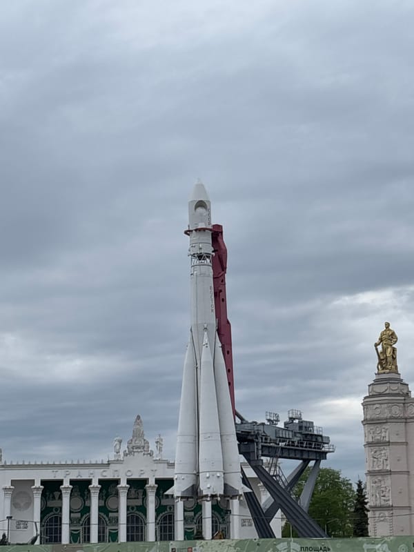 Visitor documents VDNKh park scenes including Vostok rocket display