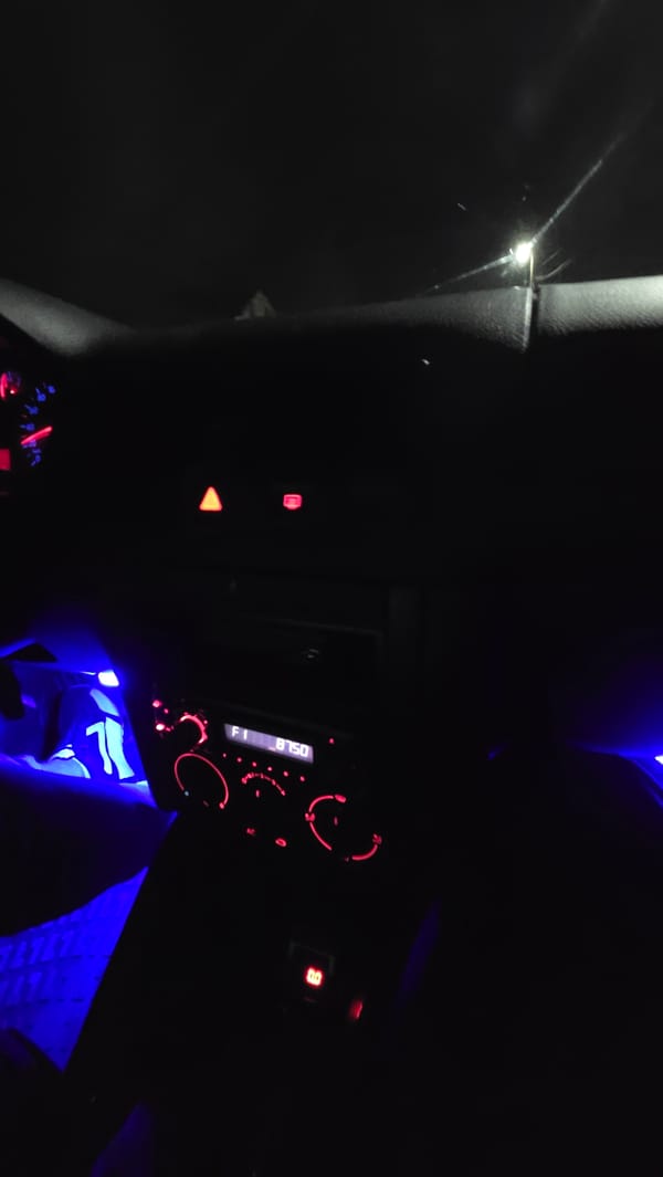 Evening scenes captured in Bania: vehicle dashboard, home shelf