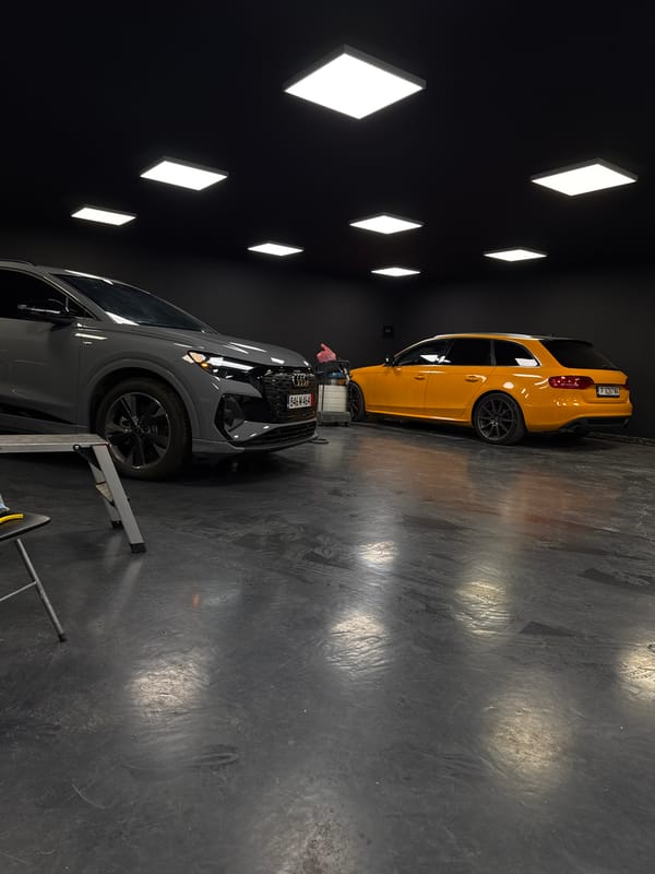 Two cars inside a sleek detailing studio in Ruse