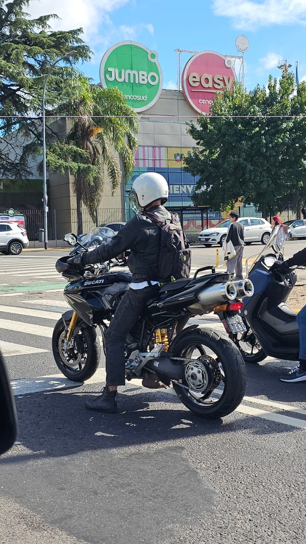 Ducati motorcyclist stops on Buenos Aires street