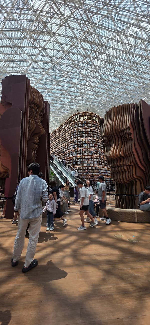 Inside Starfield Library's towering open stacks at COEX Mall