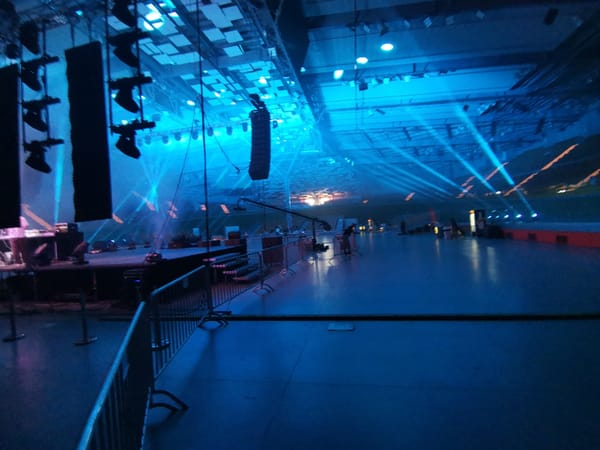 Blue-lit event setup captured at Plovdiv's Kolodruma Sports Hall