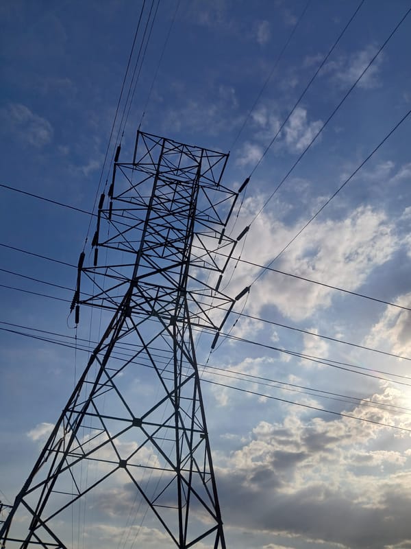 Electricity pylon photographed against cloudy sky in Ciudad Guayana