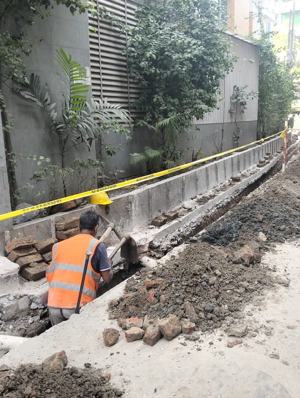 Morning construction work underway across Dhaka streets