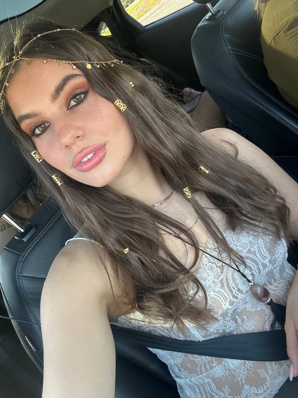 Woman in ornate attire observed in vehicle, Rancho Mirage