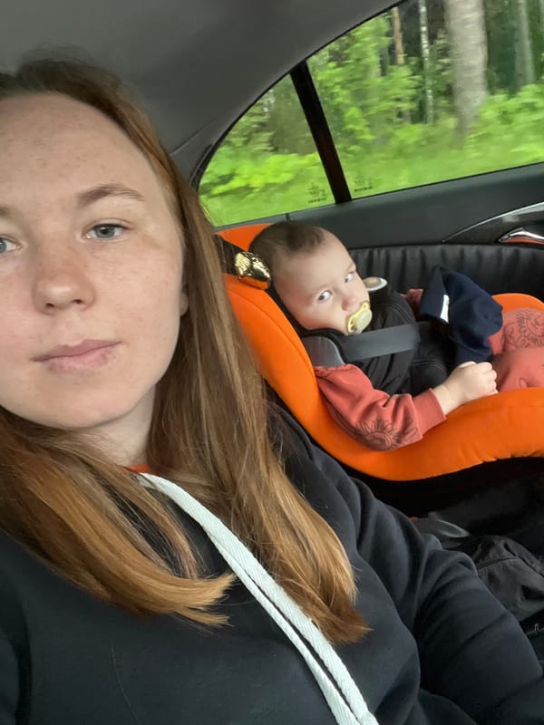 Woman and infant travel together in vehicle in Russia