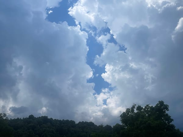 Dramatic storm clouds and sunlight captured over Berkovitsa, Bulgaria
