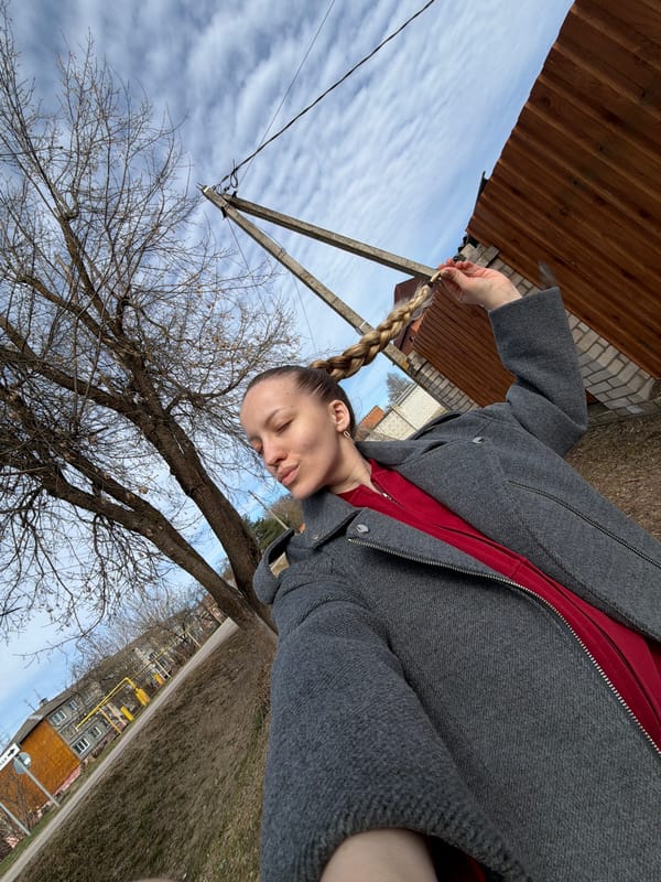Woman takes outdoor selfies in Reshetnikovo, Russia