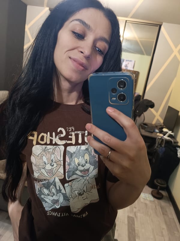 Woman Takes Selfie in Simferopol Wearing Tom Jerry Shirt