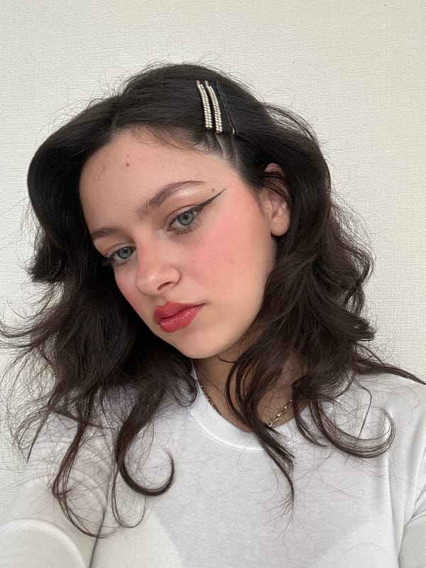 Woman takes multiple selfies in Yerevan morning session