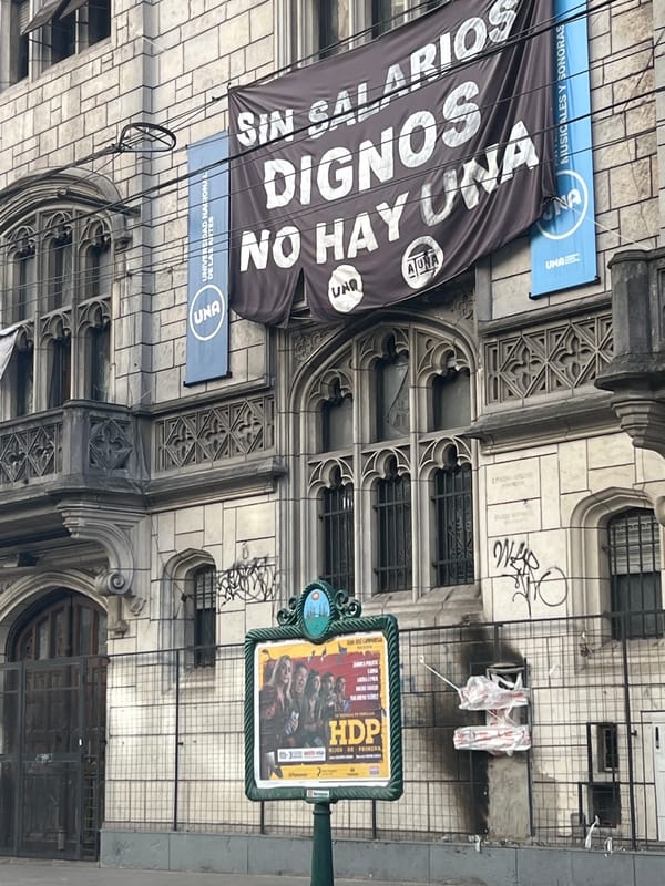 Buenos Aires Gothic architecture documented amid labor protest signage