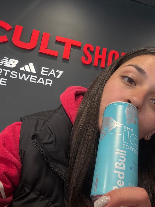 Woman shops for sneakers at athletic retailer in Bulgaria