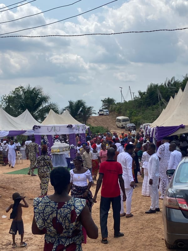 Funeral service held in Achara, Nigeria with floral decorations