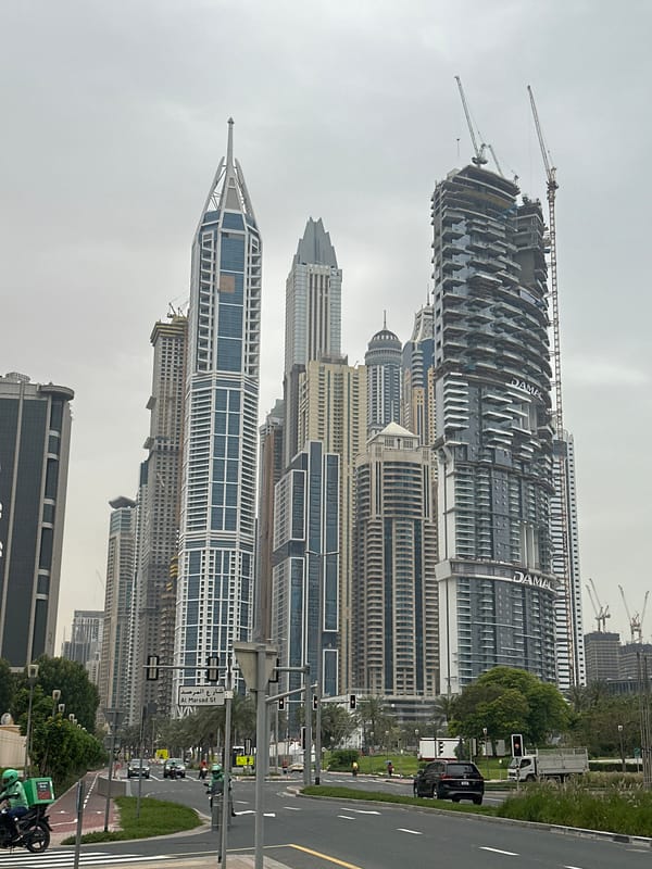 Dubai street views show skyscrapers and bike path infrastructure