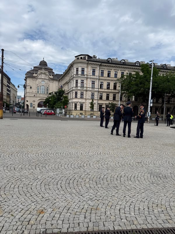 Uniformed officials gather at Bratislava government building