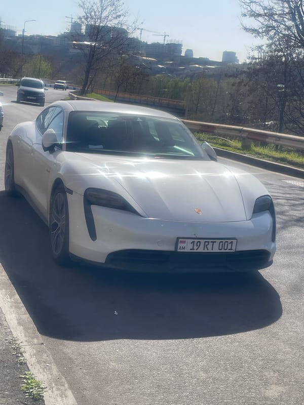 White Porsche spotted on Yerevan street with Mount Ararat backdrop