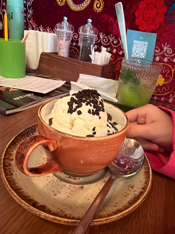 Family enjoys desserts together at Veliky Novgorod restaurant