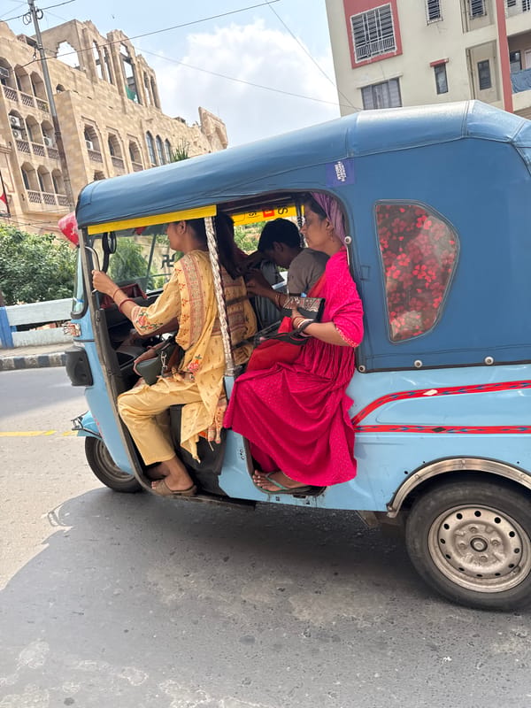 Auto rickshaw with passengers observed on Kolkata street