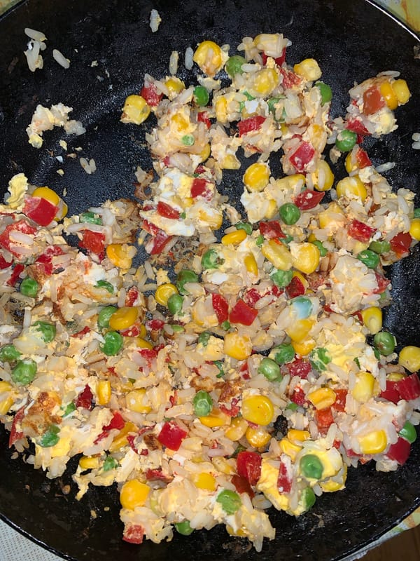 Home cooking session features fried rice and chicken stew