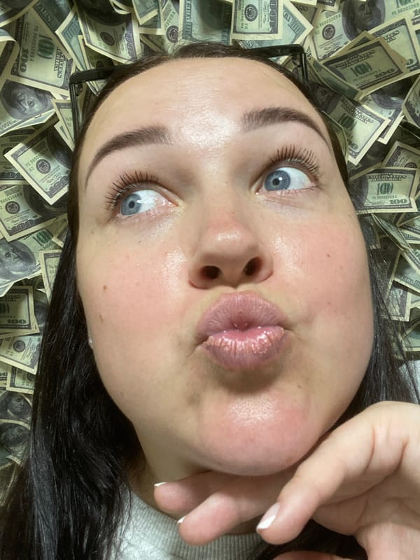 Woman photographed posing with cash bundles in Sochi hotel