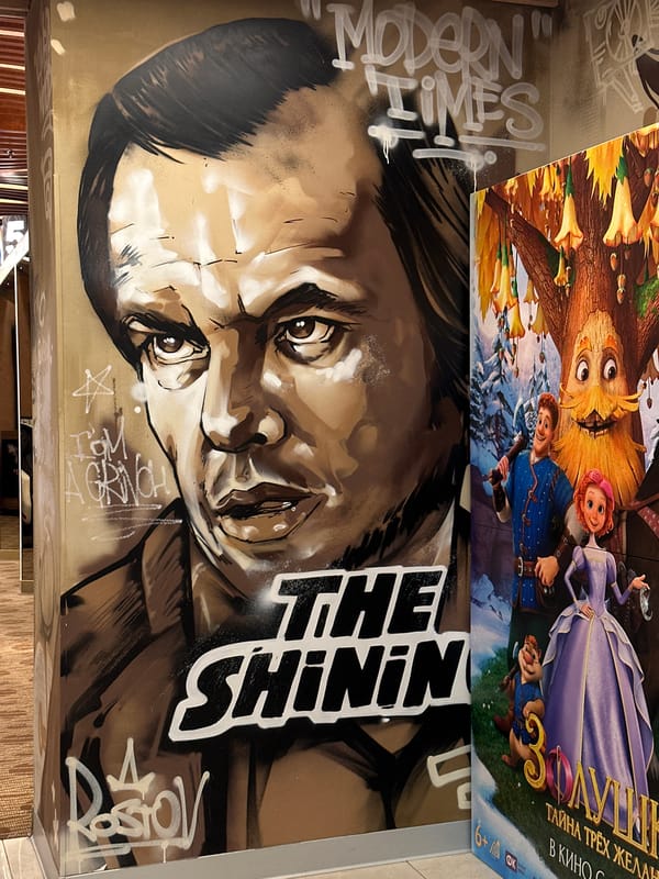 Movie posters spotted against wall in Rostov-on-Don