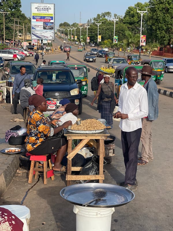 Street vendors sell peanuts along Jos roadside