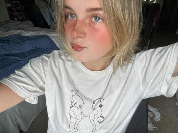 Young person with nose ring photographed upside down in Whistler