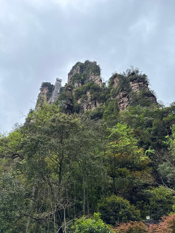 Early morning tourism activity at Luoguta's scenic rock formations