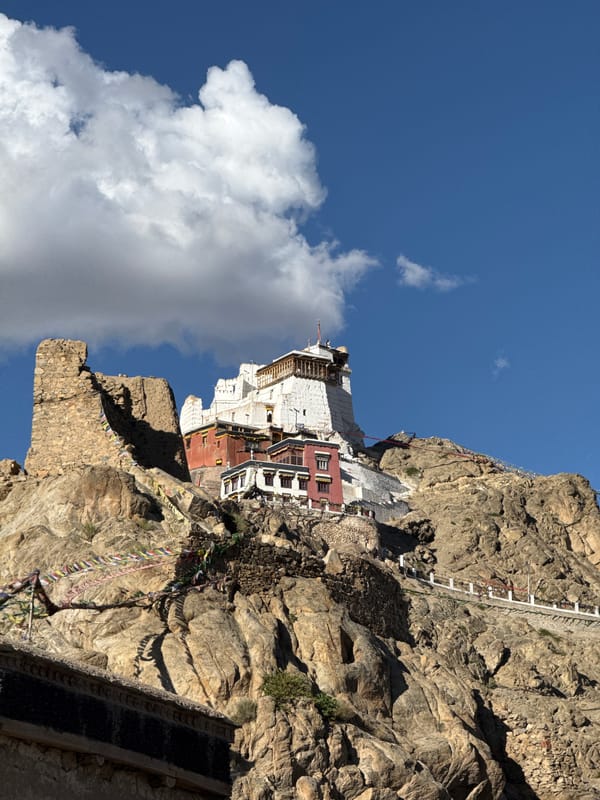 Leh's hilltop monasteries and stupas under a clear summer sky