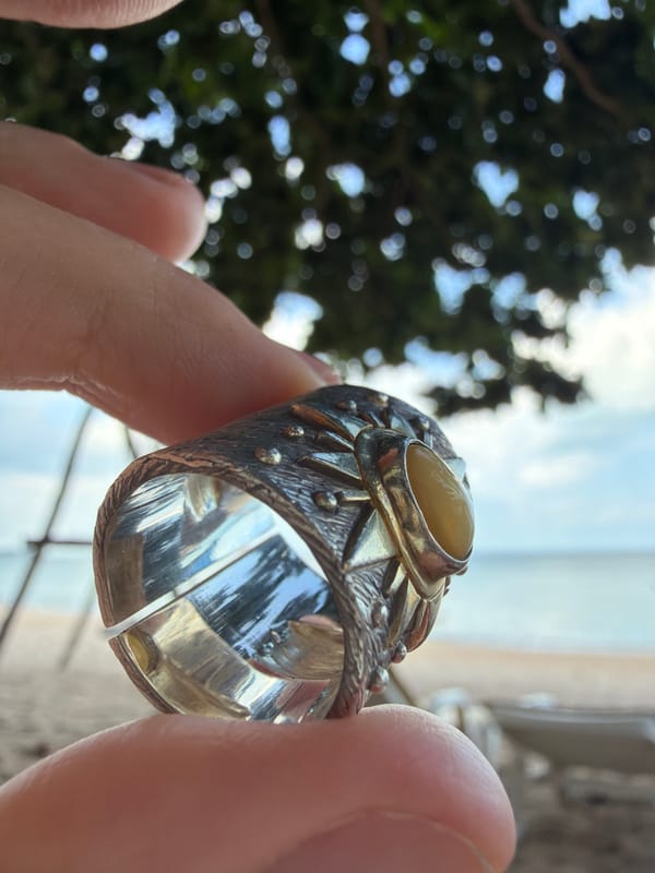 Lazy beach morning on Ko Samui with rings, loungers, and jet skis