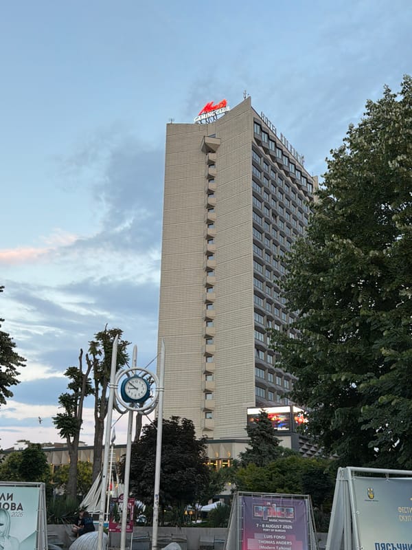 Hotel Burgas and pennant-lined streets on a cloudy evening