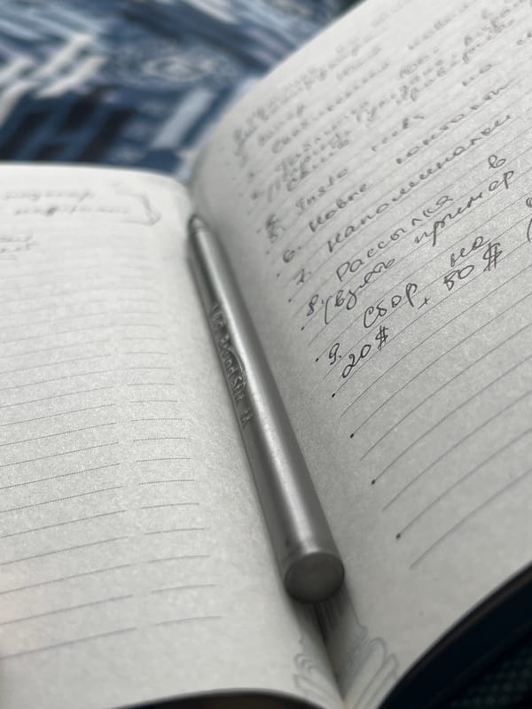Notebook notes and a old key, quietly detailed in rural Georgia