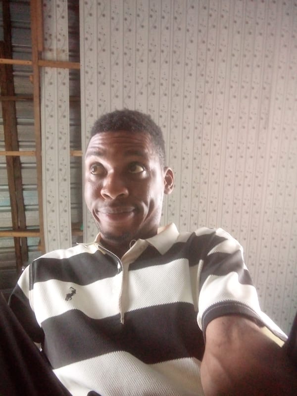 Man in striped polo shirt observed in Ikorodu, Nigeria