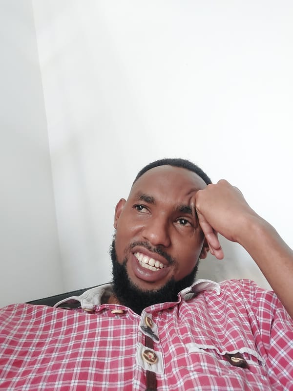 Man takes selfie while appliance shopping in Dar es-Salaam