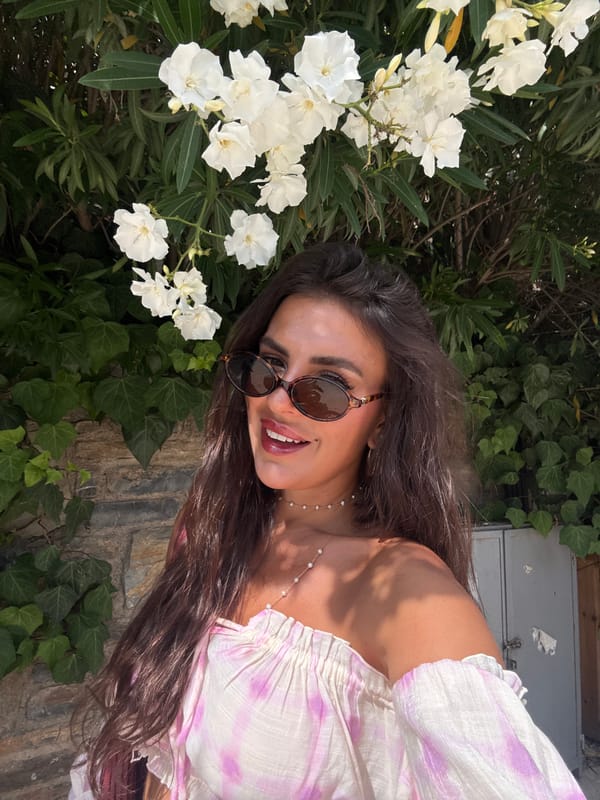 Woman enjoys morning strawberries, selfies in scenic Bodrum