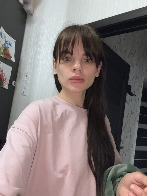 Woman takes mirror selfies in Rostov-on-Don early morning