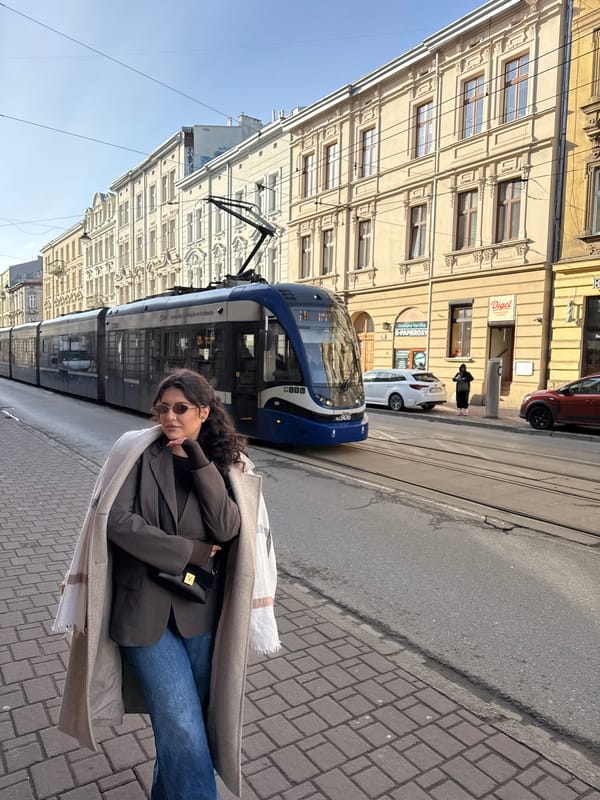 Morning tram commute captured on historic Krakow streets