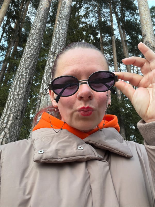 Person in orange jacket documented around Chaikovsky, Russia
