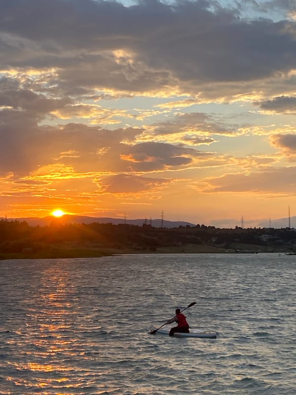 Paddleboarding at golden hour on a Tbilisi reservoir