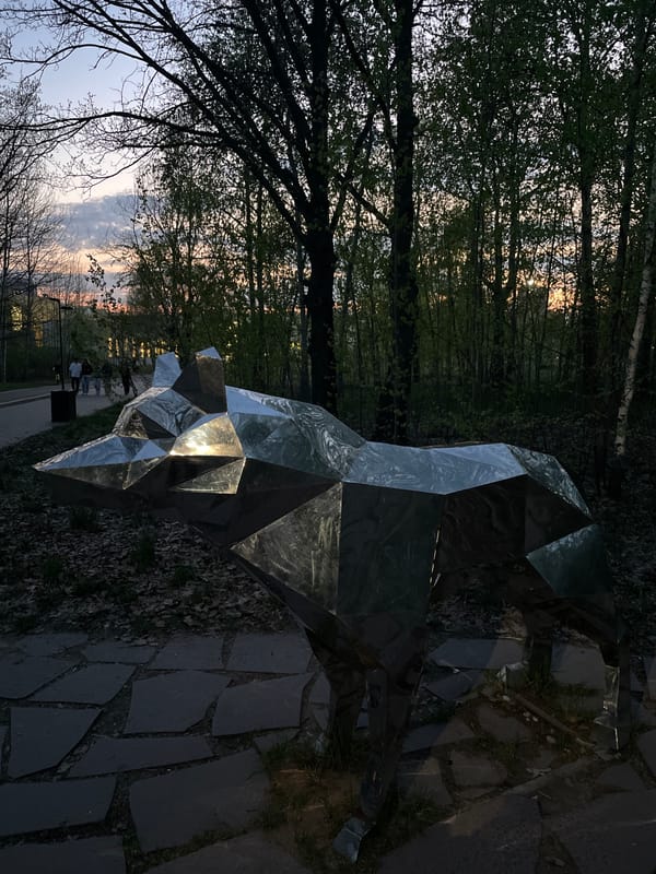 Evening documentation captures metal sculpture and dusk scenes in Kazan