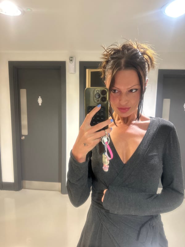Woman takes selfie in London restroom