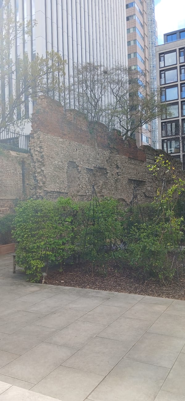 Tourist documents historic London landmarks in brief walking tour