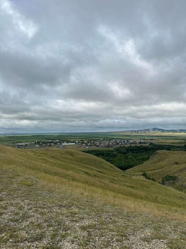 Sweeping steppe hills and wildflowers outside Kokshetau, Kazakhstan