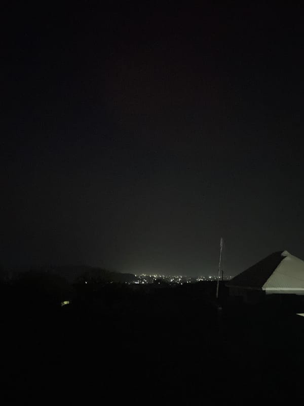 Evening documentation captures nighttime photography and dinner in Jos