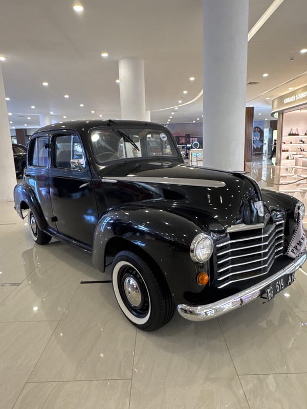 Vintage car show displayed at Indonesian shopping mall