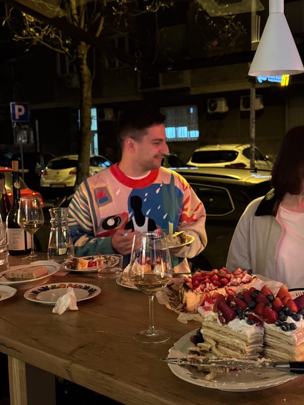 Group dining gathering with cake observed in Belgrade restaurant
