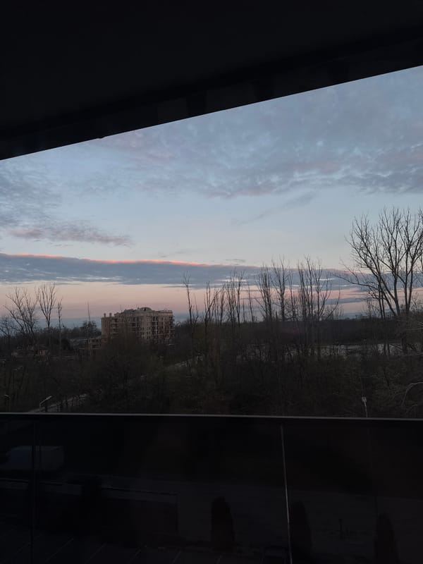 Dawn cityscape view captured from Plovdiv building window