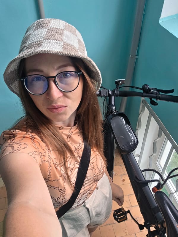 Selfies and a bike ride along a paved stone path