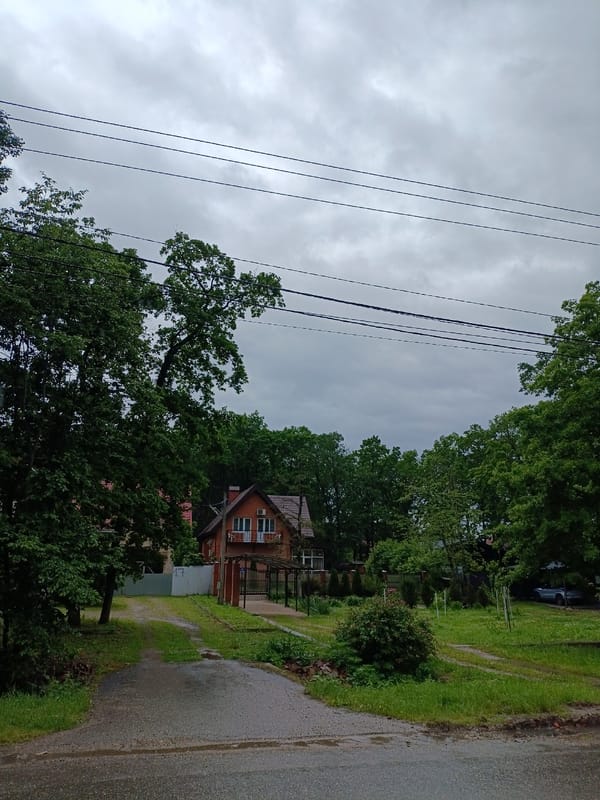 Wet morning streets documented across Goryachiy Klyuch, Russia