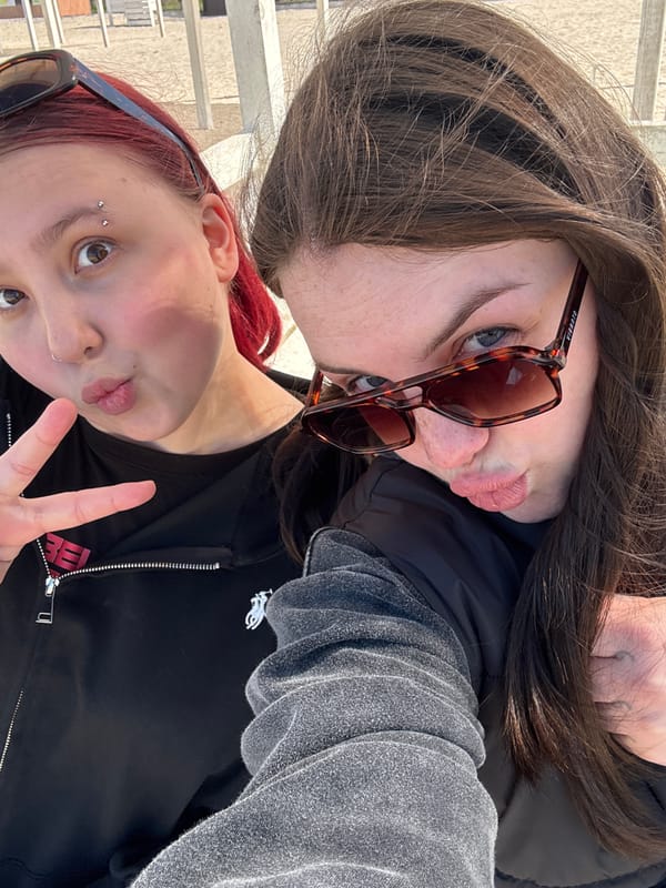 Two people take playful selfie in Chornomorskoe, Ukraine